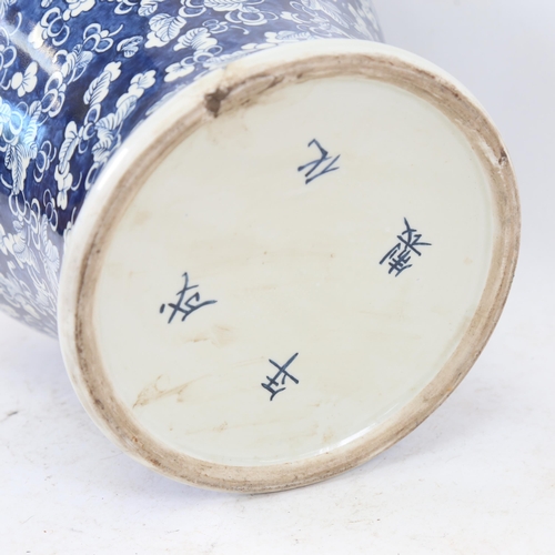 429 - A large Chinese blue and white porcelain baluster jar, with foliate decoration and butterflies, 4 ch... 