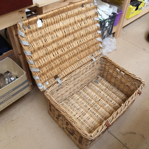 437 - A Vintage wicker laundry basket, length 70cm