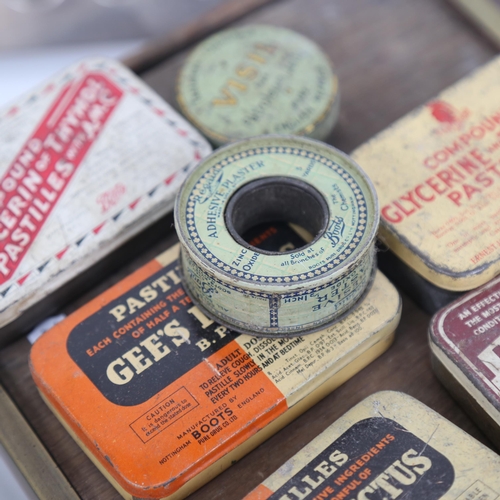 451 - Victorian brass pill makers, silver plated Chemist shop mould-maker, and various tins