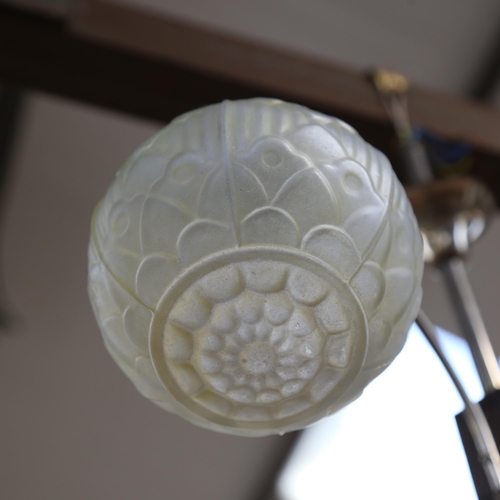 477 - An Art Deco style ceiling light fitting, with moulded glass globes, 58cm across