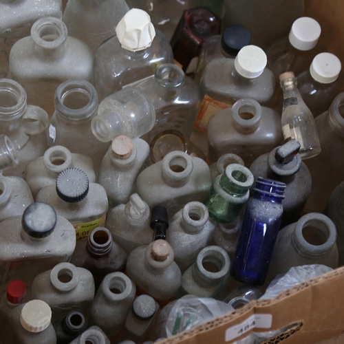 484 - A box of bottles, including Boots, milk bottles etc