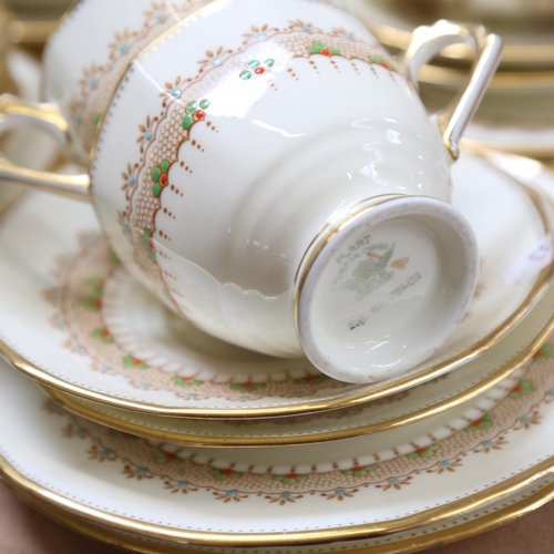 494 - 1930s Tuscan china tea service for 12 people, with printed and enamelled decoration