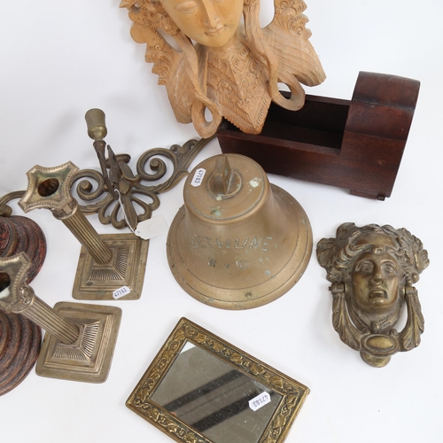 502 - A Bethune military bell, height 17cm, a brass door knocker, candlesticks, a photo frame etc