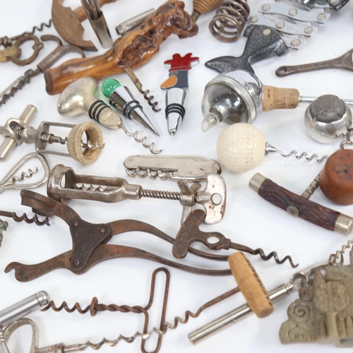 508 - A collection of Vintage corkscrews and bottle openers