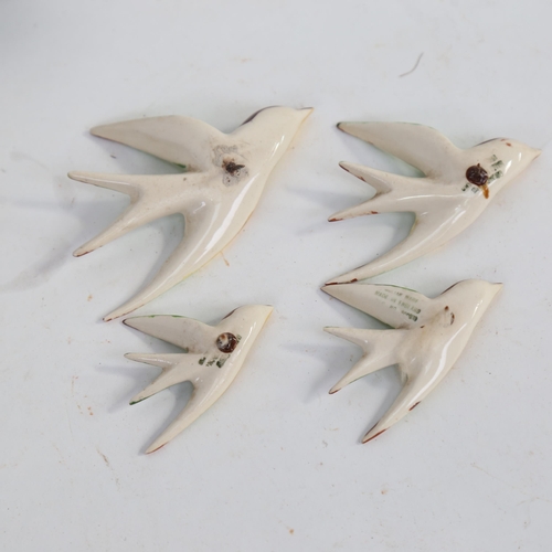 532 - 1930s Soho Pottery group of swallows, longest 9.5cm