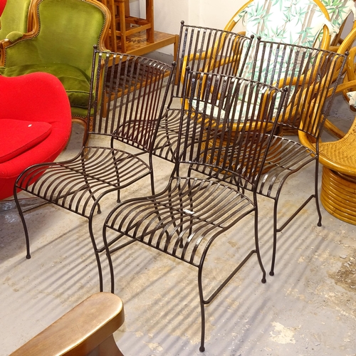 2503 - A set of 4 wrought-iron garden chairs