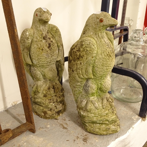 2712 - A pair of weathered concrete garden eagle statues, H40cm