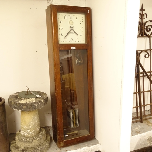 2721 - An early 20th century oak-cased National Time Recorder Company Ltd electric clock, W37cm, H131cm