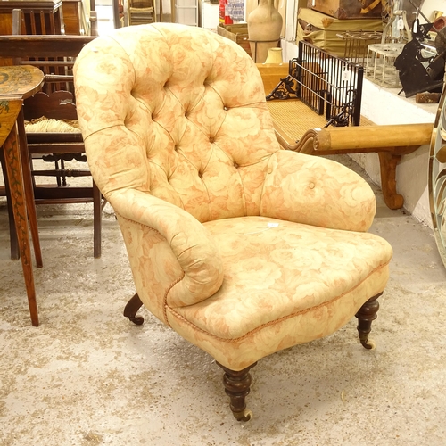 2731 - A Victorian button-back upholstered armchair