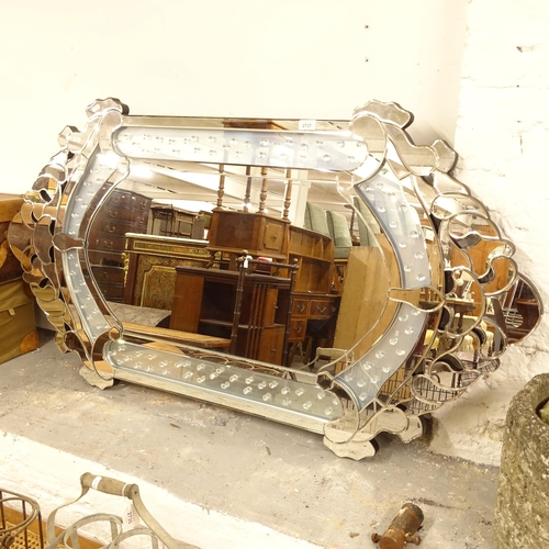 2737 - A Venetian style wall mirror, L146cm