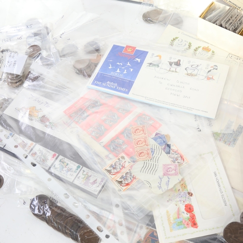 591 - A quantity of British pre-decimal coinage, and a folder of First Day Covers and loose stamps