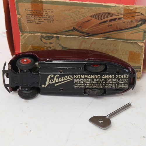 665 - A Vintage tinplate clockwork Schuco Commando Anno 2000 toy saloon car, boxed