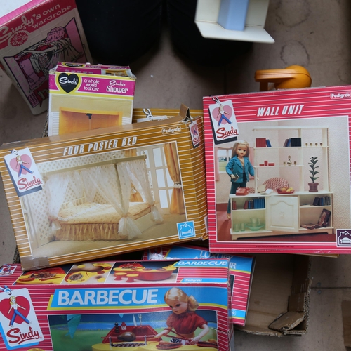 674 - A large quantity of boxed Sindy Doll items, including shower, and wardrobe etc