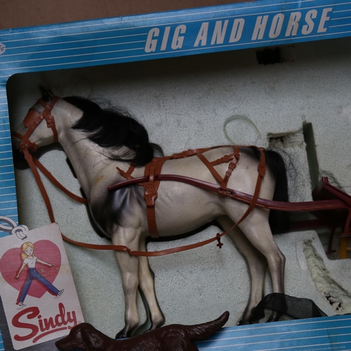 675 - A boxed Sindy Gig and Horse, and a Sindy pram