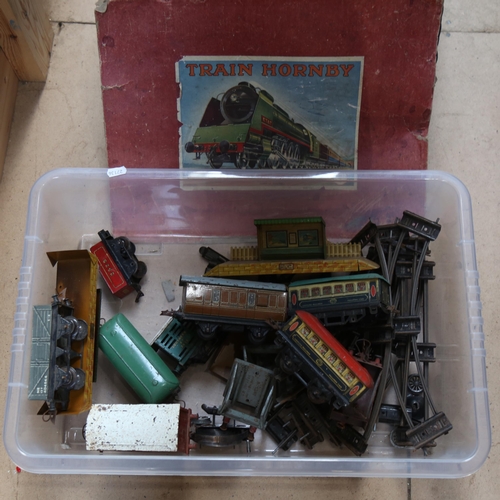 678 - A quantity of French Hornby tinplate railway carriages and wagons, track etc