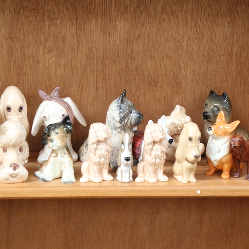 690 - A collection of dog figures, including Sylvac, tallest 14cm