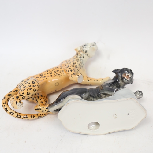 702 - A Beswick leopard, and a black panther no. 1823