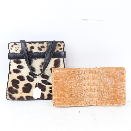 707 - A Vintage crocodile skin clutch bag, width 30cm, and a leopard fur-covered leather handbag and purse