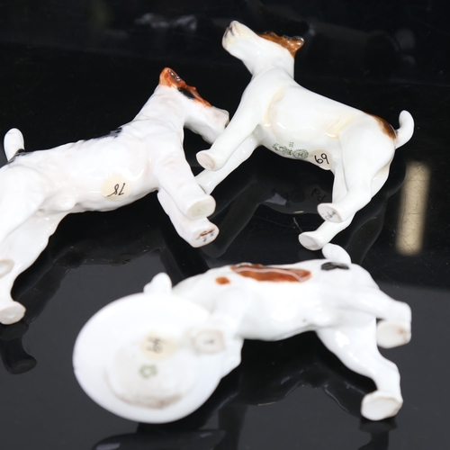 769 - 3 Royal Doulton dog figures, comprising HN1014 Rough-haired Terrier, similar HN923, and Beagle with ... 