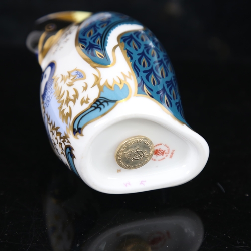 781 - A Royal Crown Derby porcelain penguin figure, with gold button