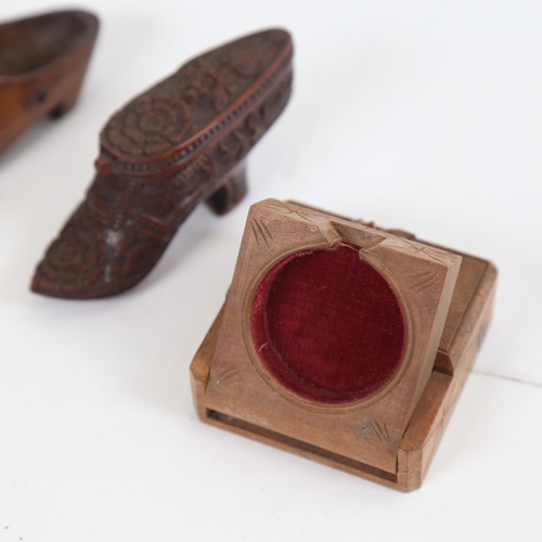 808 - A treen lady's shoe snuffbox, a carved wooden clog, and Grindelwald travelling pocket watch case (3)