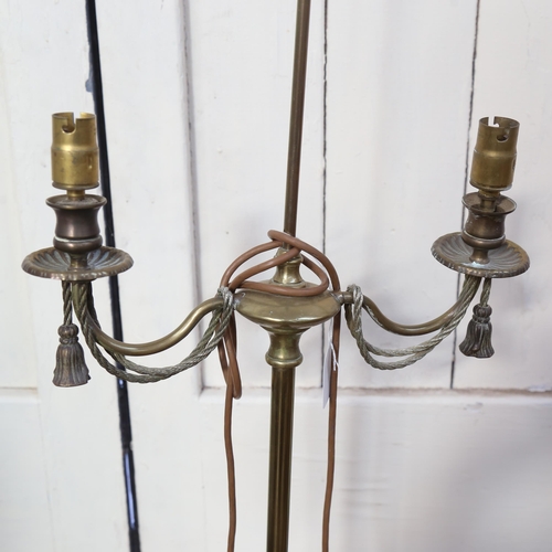 810 - A brass twin-branch standard lamp, height 155cm