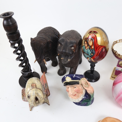 818 - Various ceramics and glass, including Royal Doulton character jugs, African hardwood elephants etc