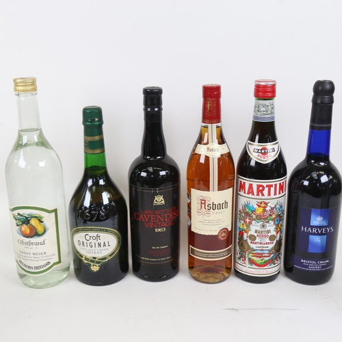 825 - Various spirits and liqueurs, including Smirnoff and Harveys Bristol Cream (11)