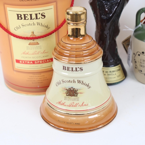 831 - Various spirits, including Bell's Ceramic Old Scotch Whisky in original box, Royal Doulton Whyte and... 