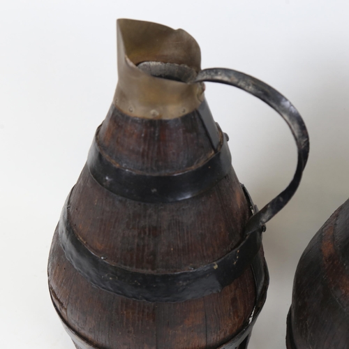 836 - A pair of coopered oak water flagons, largest height 31cm