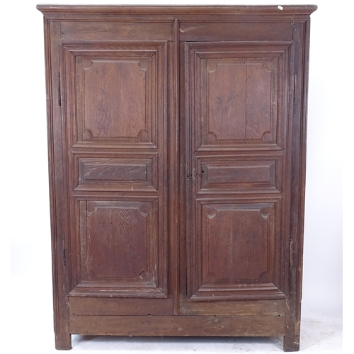 2418 - An 18th century joined oak hall cupboard, with 2 fielded panelled doors (A/F), W140cm, H185cm, D51cm