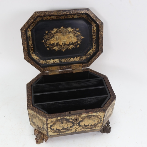 1028 - A 19th century Chinese chinoiserie gilded black lacquer casket, with sectioned interior, on gilded d... 