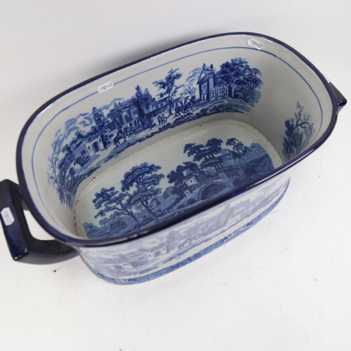 1054 - A reproduction blue and white transfer printed 2-handled footbath, length 53cm overall