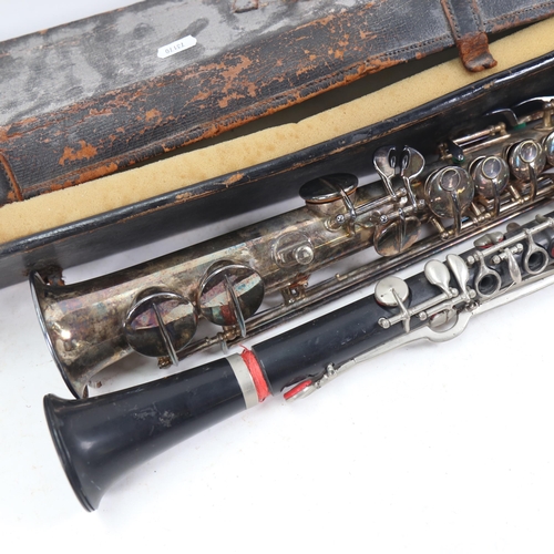 1089 - A Besson silver plated clarinet, and an ebony clarinet with plated mounts