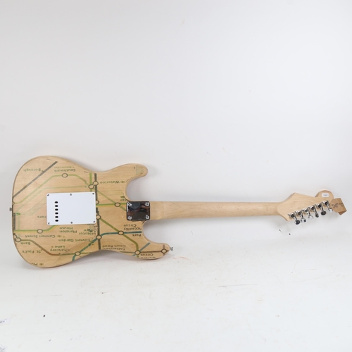 1091 - An electric guitar, with London Underground design