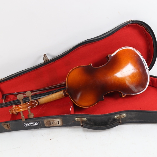 1094 - A violin, back length 34cm, with 2 bows in case