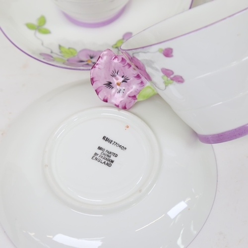 874 - An Art Deco Paragon China Purple Pansy pattern part tea and cake service, comprising 5 x cups, 5 x s... 