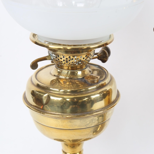 896 - 2 brass oil lamps, height 50cm