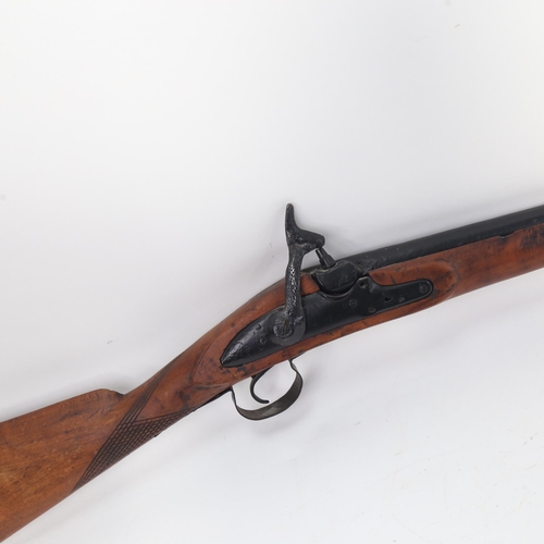 917 - A percussion cap rifle, lock mark N Hanton, barrel length 88cm