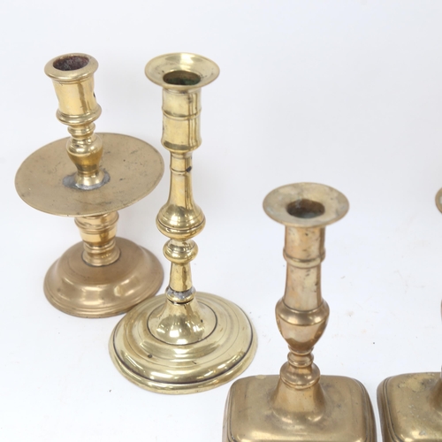 937 - 2 pairs of Georgian brass candlesticks, and 2 early candlesticks with brass drip pans (6)