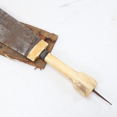 948 - An Eastern ivory-handled dagger, with hide sheath, blade length 24cm