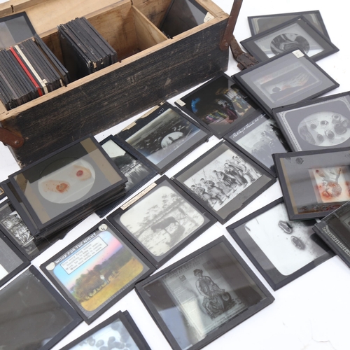 954 - A collection of Victorian glass magic lantern slides