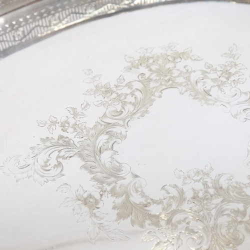 1201 - A Mappin & Webb silver plate on copper oval galleried tea tray, with scrolled engraved decoration, o... 