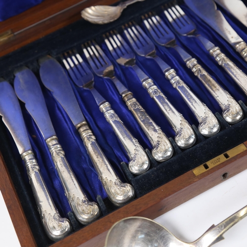 1217 - A canteen of mixed plated cutlery, hot water jug, ladle etc