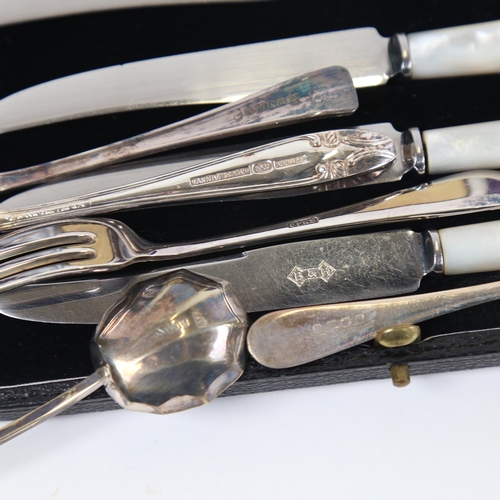 1224 - A cased set of 6 silver-handled cake forks, and 10 other cased sets of plated cutlery and servers