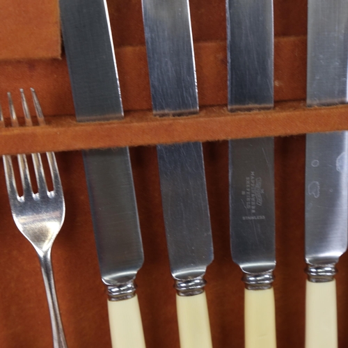 1240 - A Mappin & Webb canteen of cutlery for 8 people, including carving set