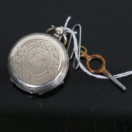 1283 - A lady's Continental engraved silver key-wind fob watch with enamel dial, working order