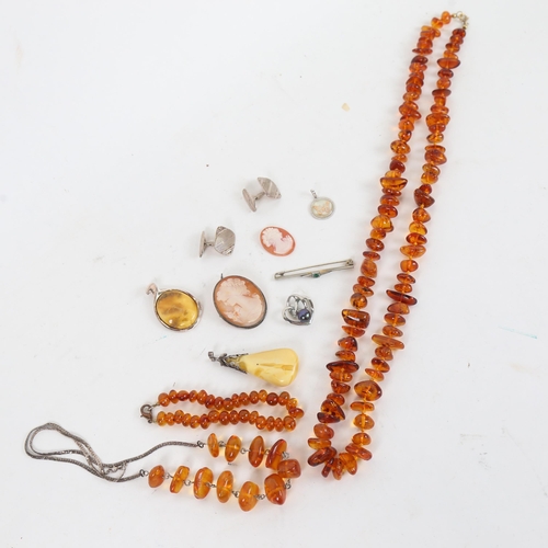 1316 - A group of silver and amber jewellery, to include necklace and bracelet, relief cameos, pendants etc