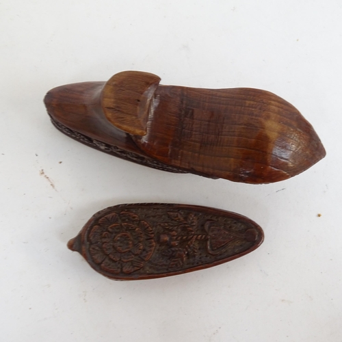 808 - A treen lady's shoe snuffbox, a carved wooden clog, and Grindelwald travelling pocket watch case (3)