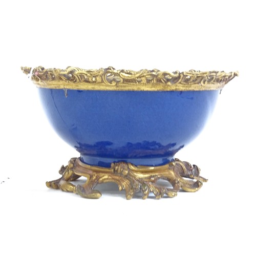 341 - A 19th century porcelain bowl with scrolled and pierced gilt-metal mounts, diameter 19cm, and a smal... 